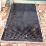 grated steel cellar door